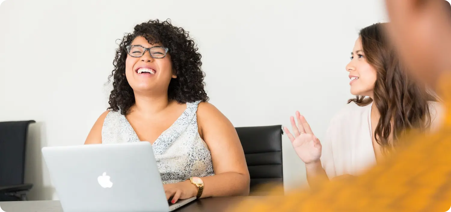 three people interacting together